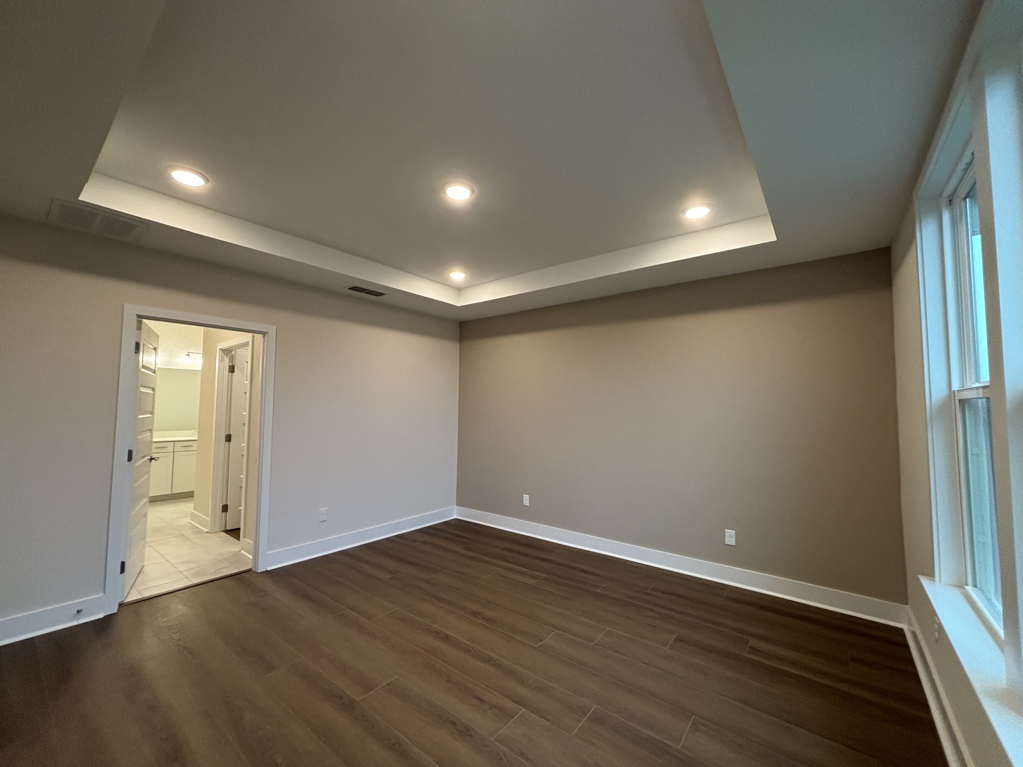 537 Scarlet Oak Road Lebanon, TN 37090 - Photo 21 of 38 an empty room with wooden floor and entrance