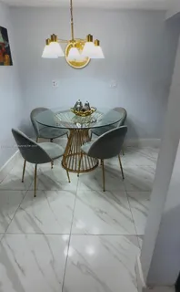 a table and chairs in a room
