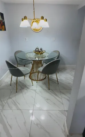 a table and chairs in a room