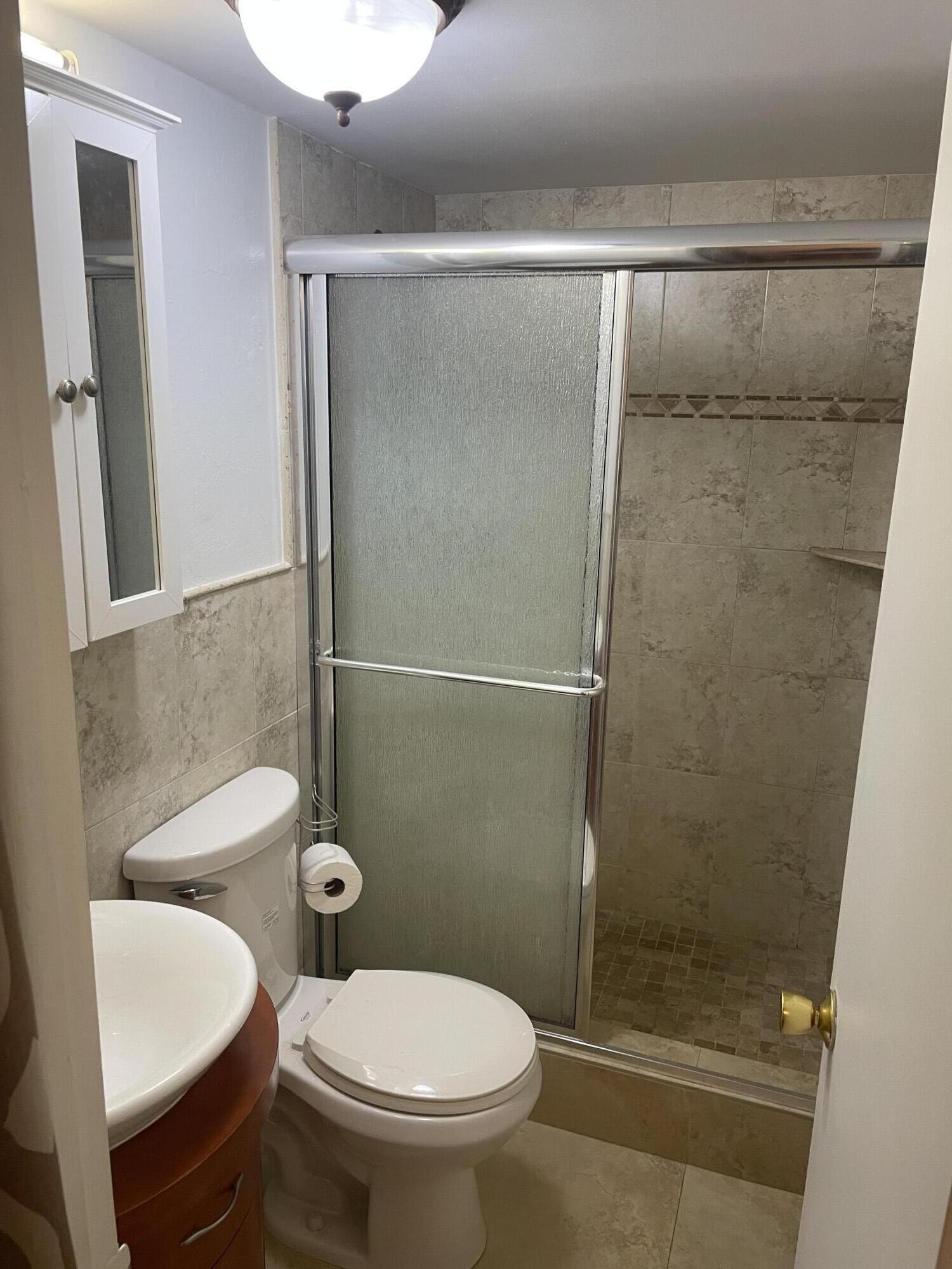 22605 Southwest 66th Avenue, Unit 100 Boca Raton, FL 33428 - Photo 7 of 9 IMG_0730
