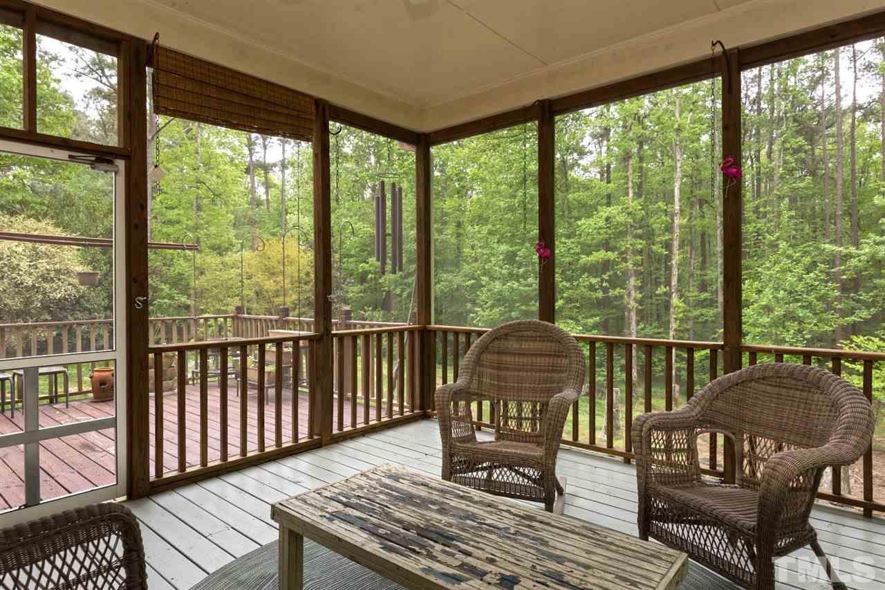 6104 Hampton Ridge Road Raleigh, NC 27603 - Photo 18 of 23 a balcony view with a couple of chairs