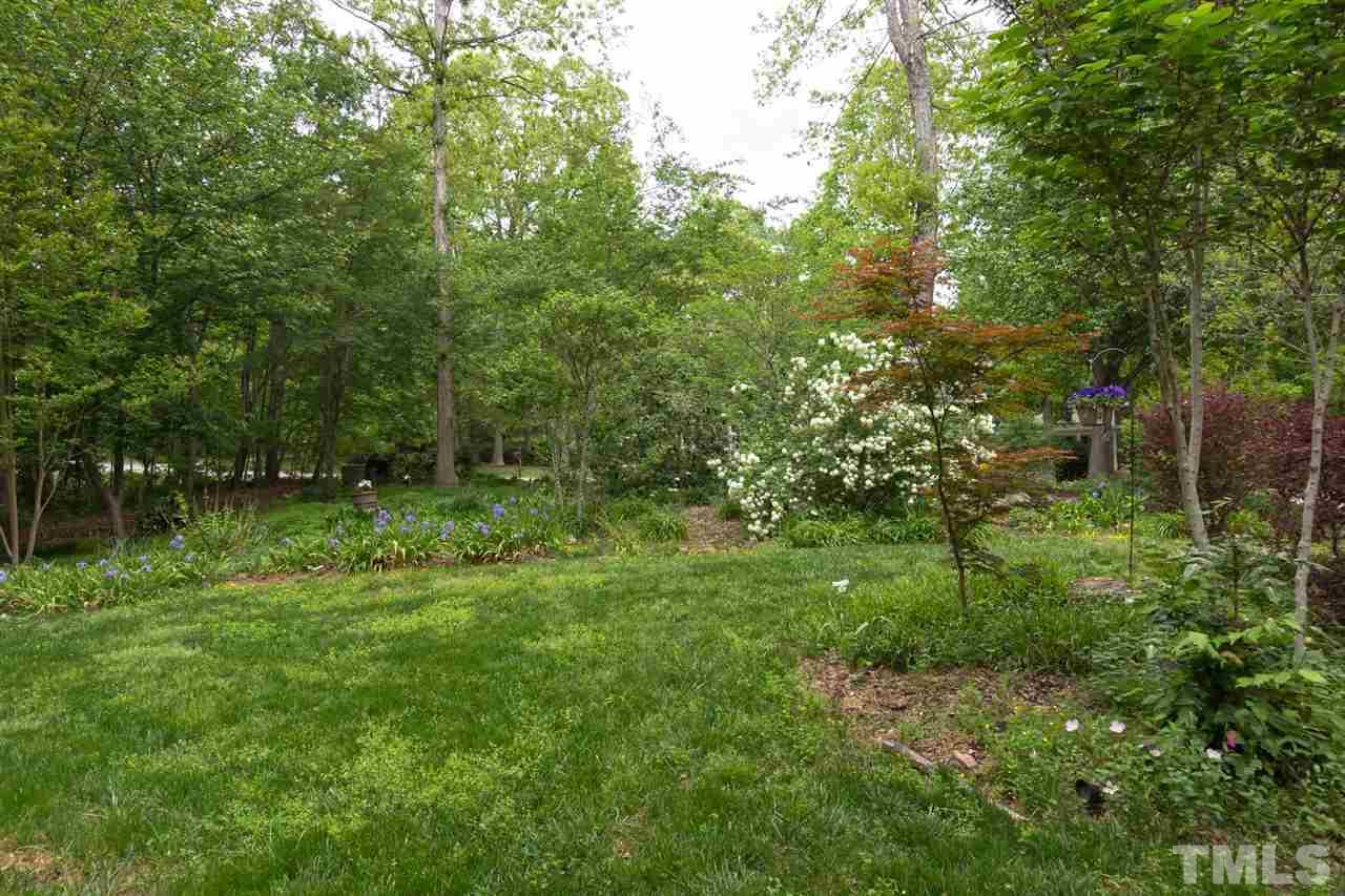6104 Hampton Ridge Road Raleigh, NC 27603 - Photo 3 of 23 a view of backyard with green space