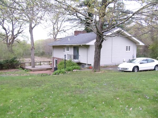 12 Boyce Farm Road Lincoln, MA 01773 - Photo 28 of 30 a white house that has a tree in front of it