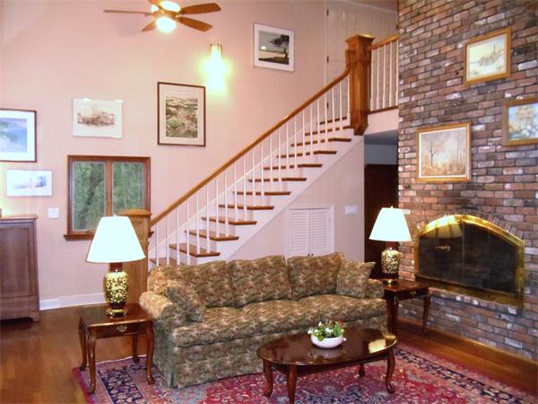12 Boyce Farm Road Lincoln, MA 01773 - Photo 6 of 30 a living room with furniture and a lamp