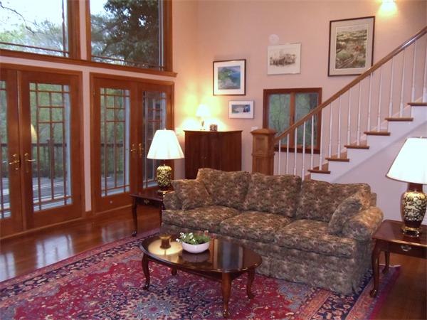 12 Boyce Farm Road Lincoln, MA 01773 - Photo 7 of 30 a living room with furniture a lamp wooden floor and a large window