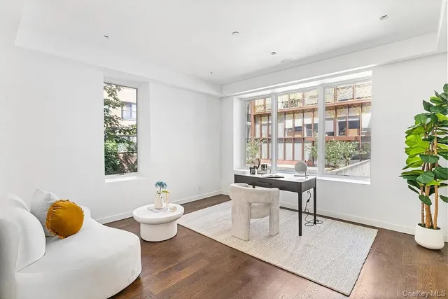 a living room with furniture and window