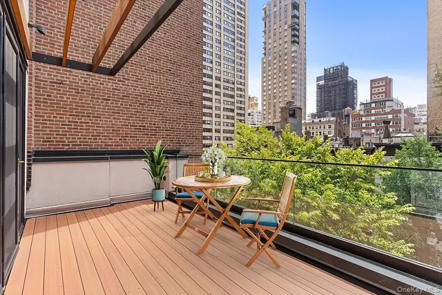 a bedroom with a large bed and a large window