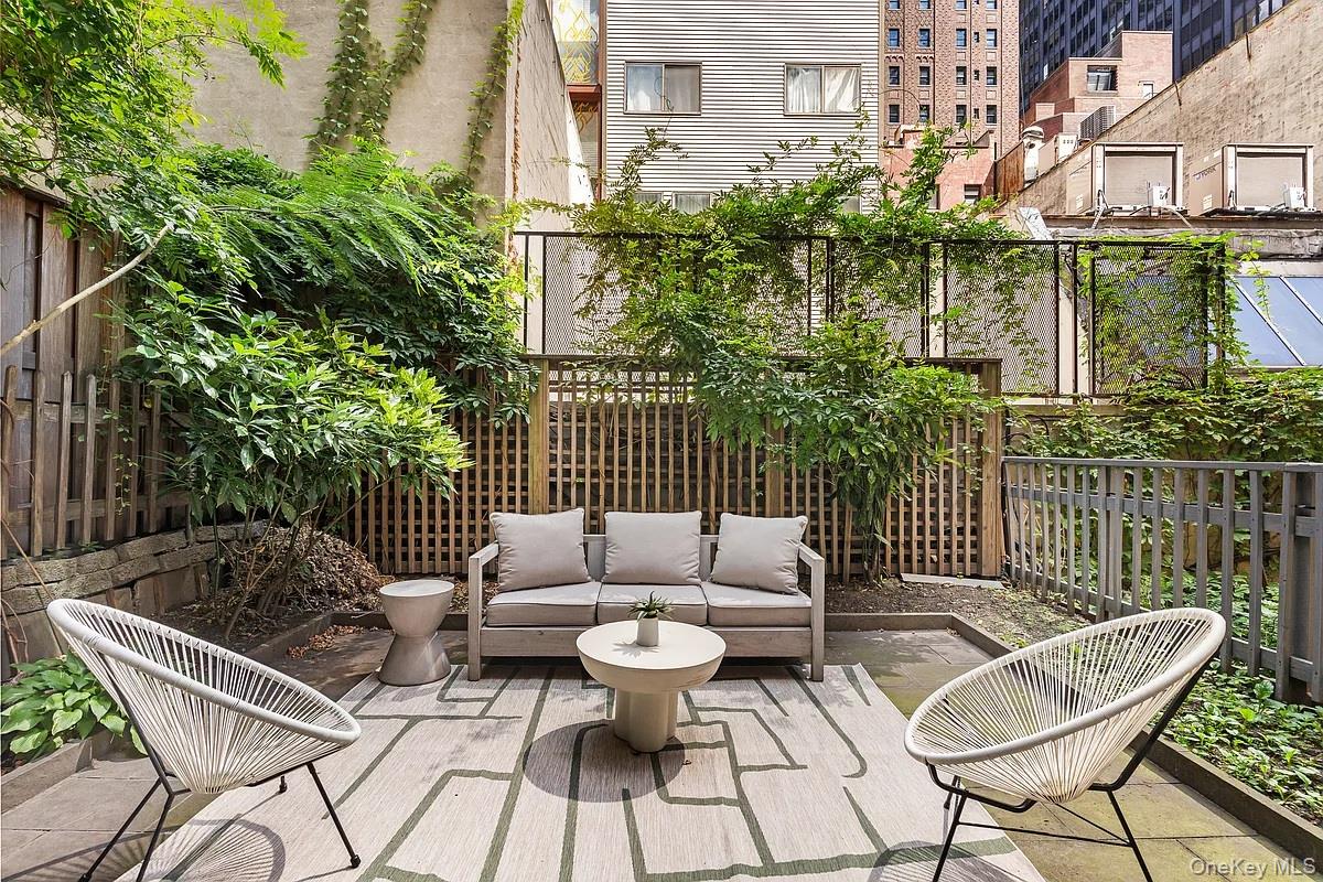 135 East 38th Street Manhattan, NY 10016 - Photo 3 of 33 a view of a patio on the roof deck