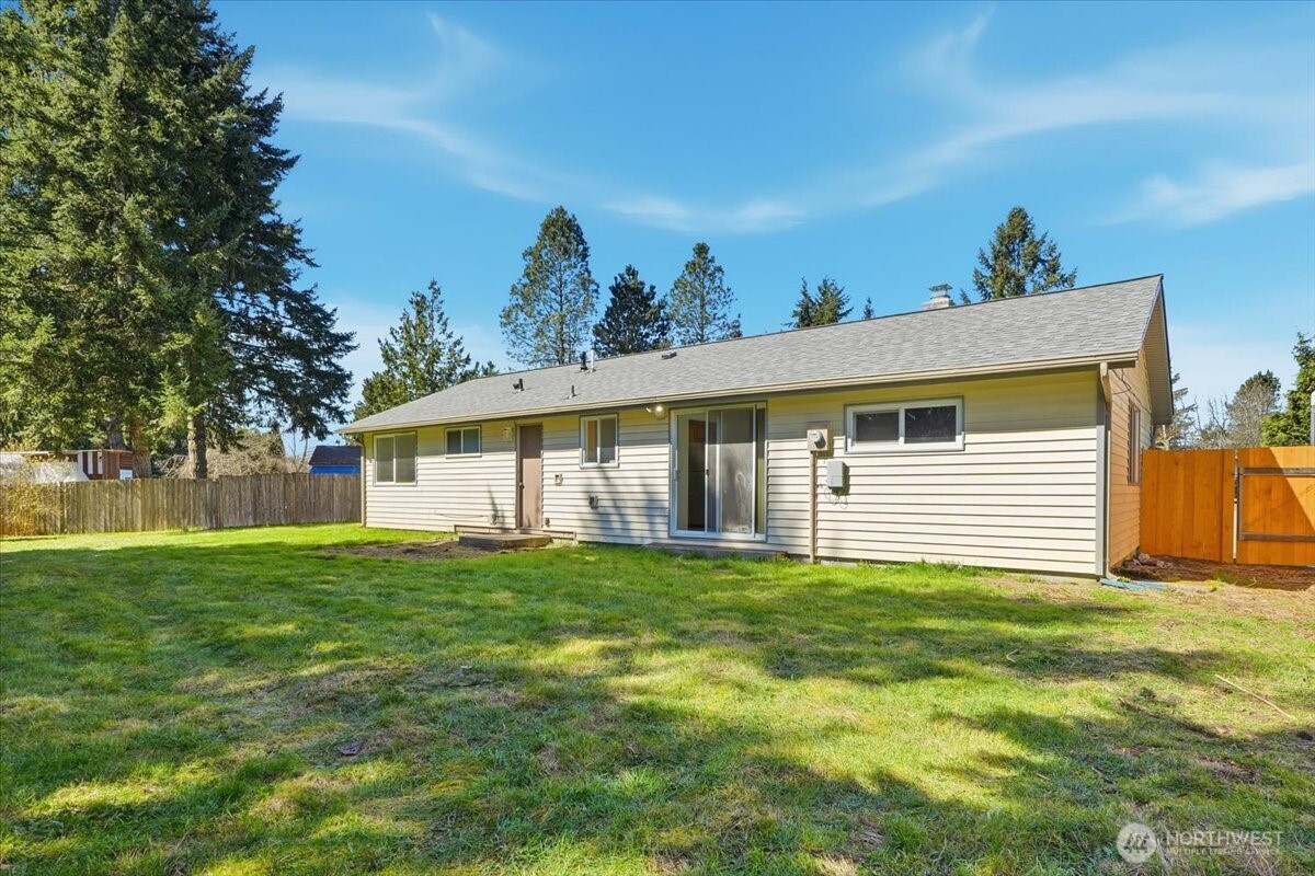 25530 150th Place Southeast Covington, WA 98042 - Photo 18 of 23 a front view of a house with a yard