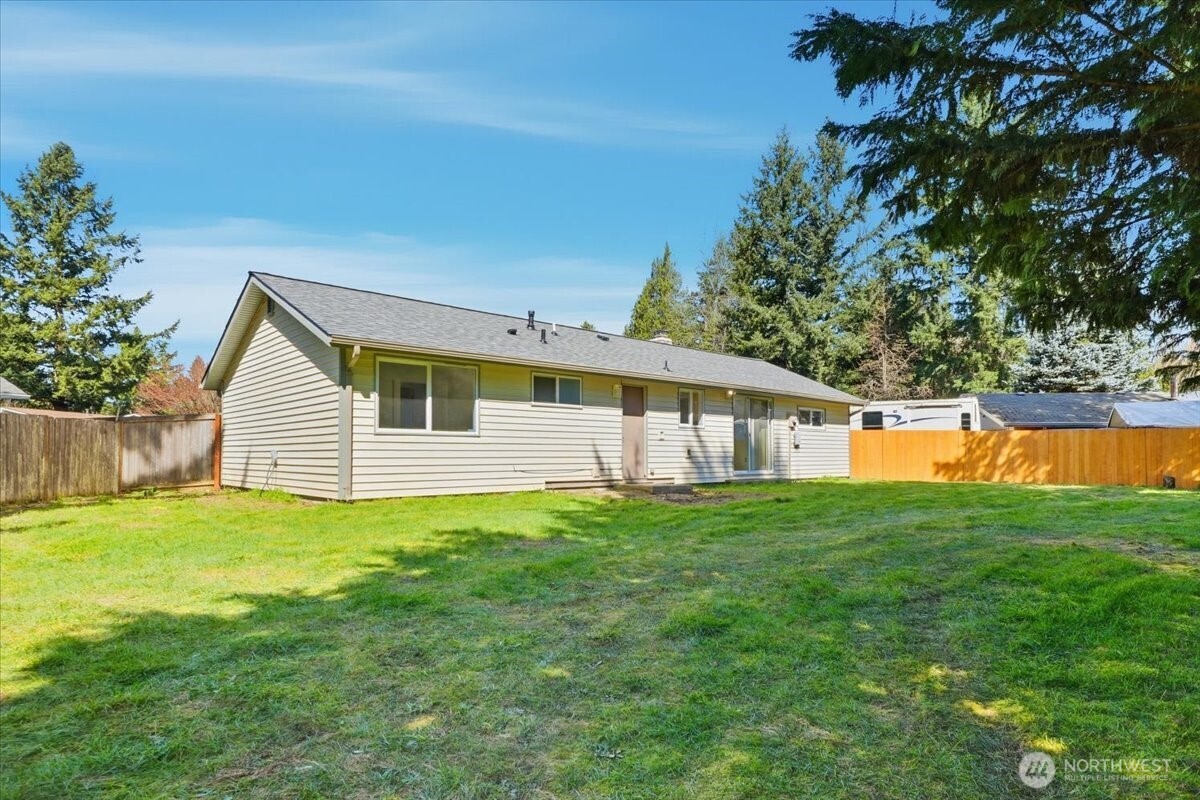 25530 150th Place Southeast Covington, WA 98042 - Photo 20 of 23 a front view of a house with yard and green space
