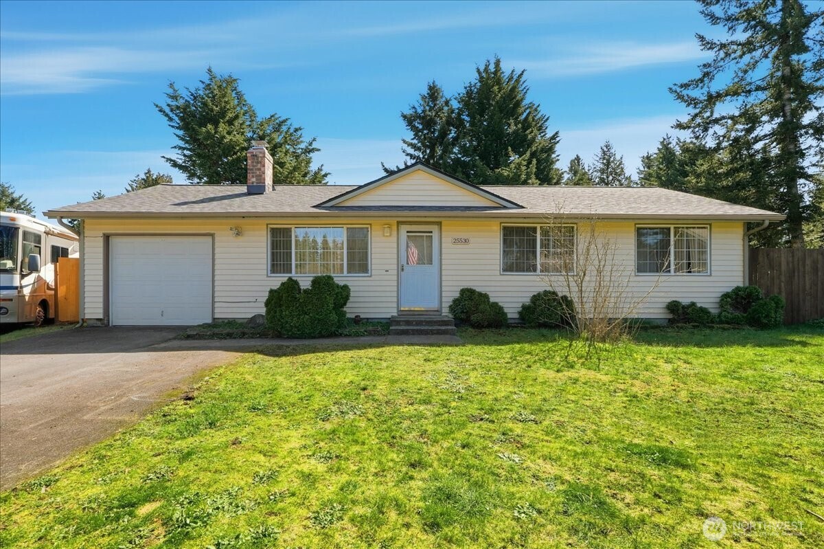 25530 150th Place Southeast Covington, WA 98042 - Photo 23 of 23 a front view of a house with a yard and garage