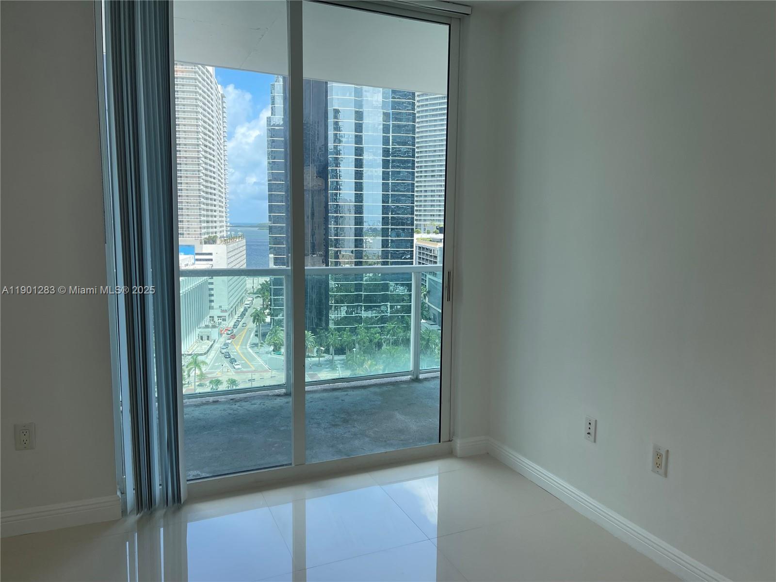 1250 South Miami Avenue, Unit 1404 Miami, FL 33130 - Photo 3 of 8 a view of a glass door and balcony