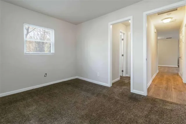 an empty room with windows