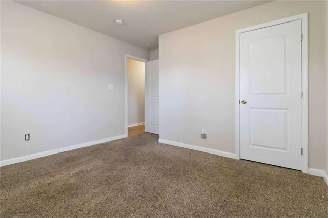 an empty room with an entryway