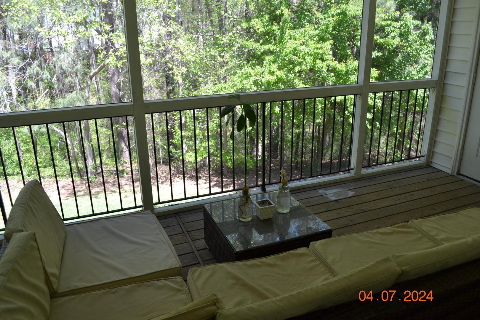 4506 Mistiflower Drive Raleigh, NC 27606 - Photo 7 of 27 a view of balcony with couch