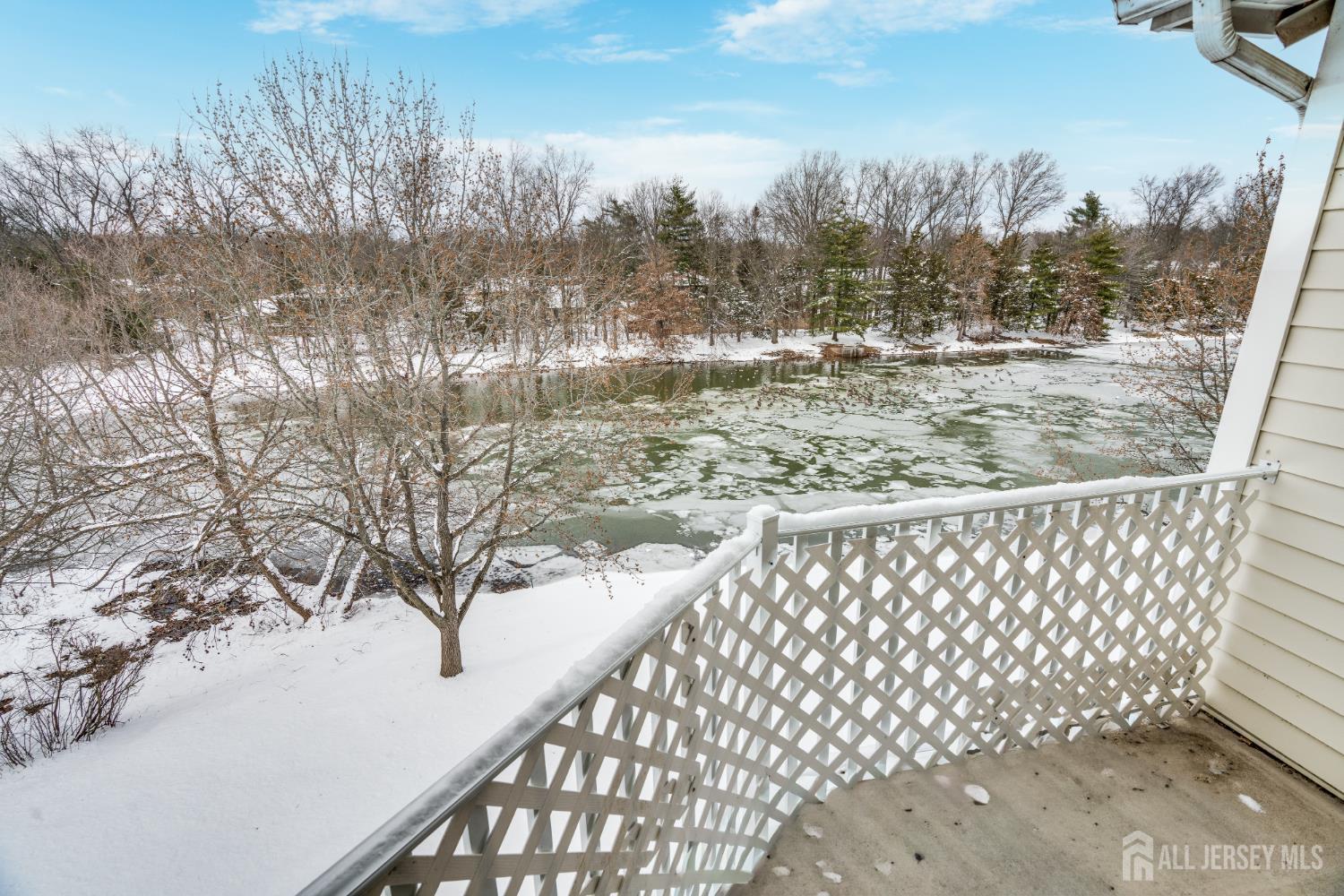 304 Wimbeldon Court North Brunswick, NJ 08902 - Photo 3 of 19 a view of a yard