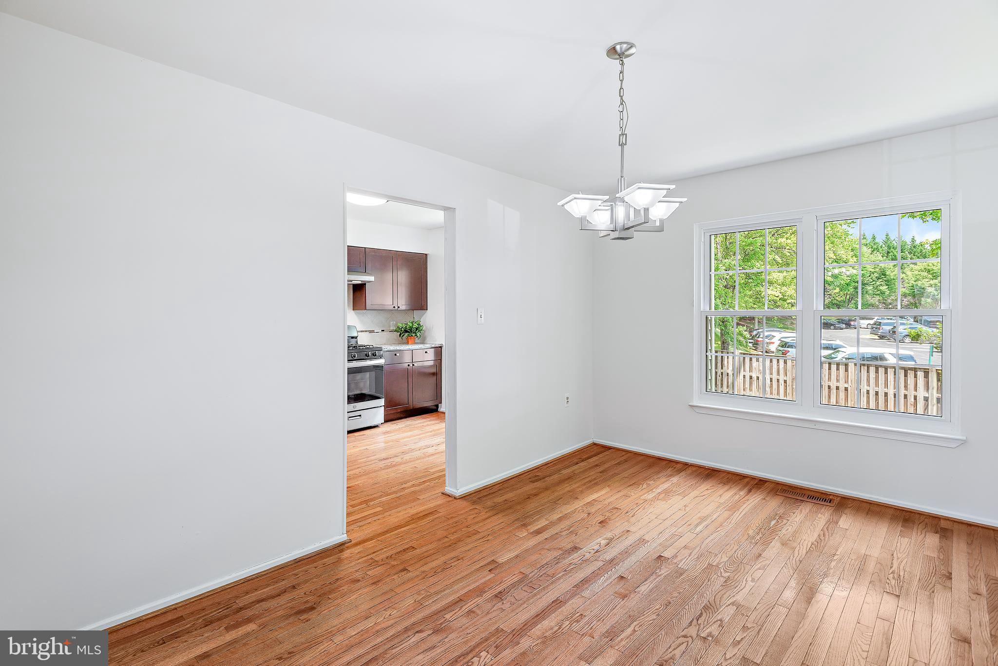 8 Narrowleaf Court Gaithersburg, MD 20878 - Photo 10 of 66 Formal Dining Room next to Kitchen