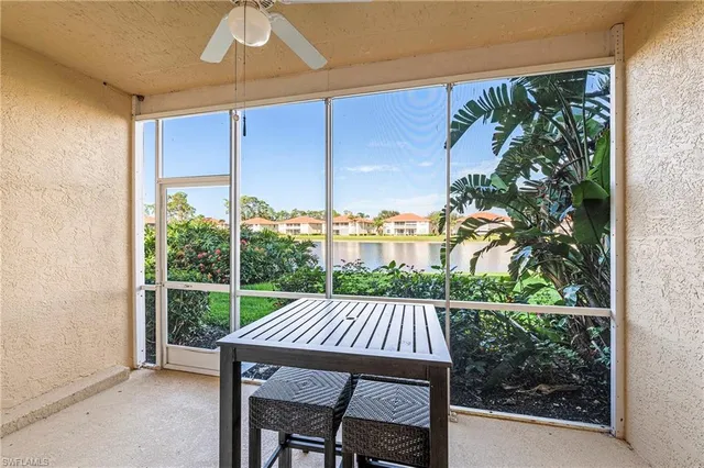 a view of a balcony with wooden floor and outdoor space