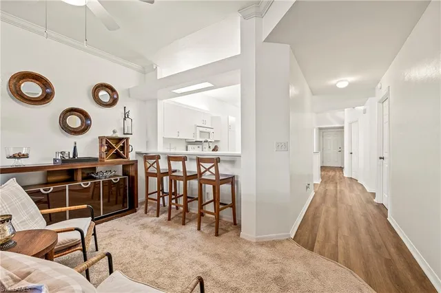 a view of a kitchen and a dining table chair