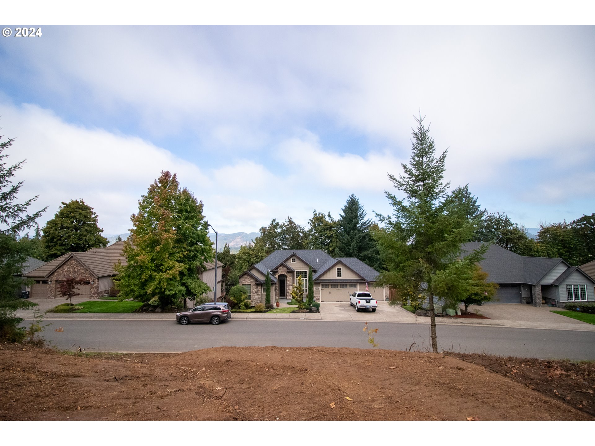 6225 Forest Ridge Drive Springfield, OR 97478 - Photo 16 of 17 a house with trees in the background