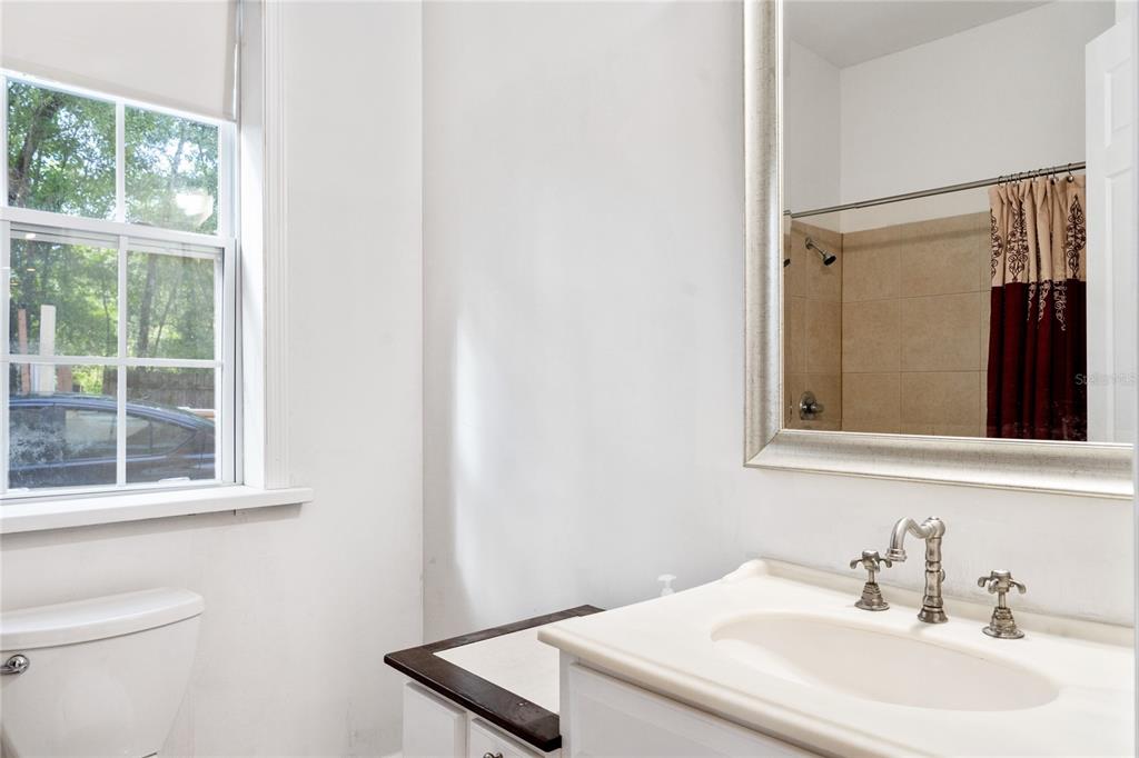 16295 Highway 40 Ocala, FL 34481 - Photo 15 of 39 a bathroom with a sink and a toilet