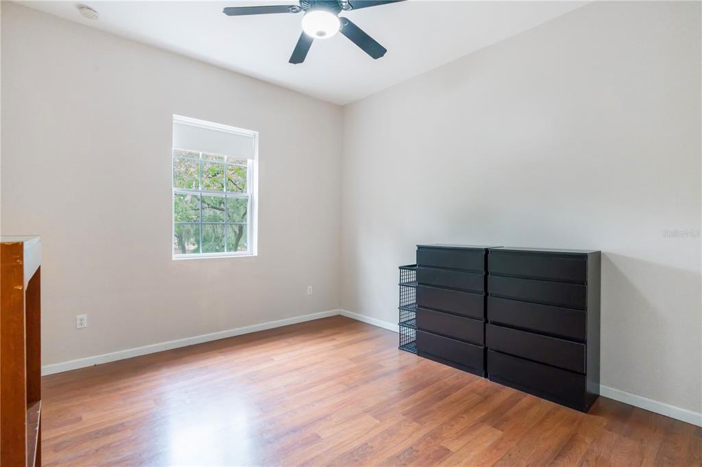 16295 Highway 40 Ocala, FL 34481 - Photo 30 of 39 an empty room with wooden floor closet and windows