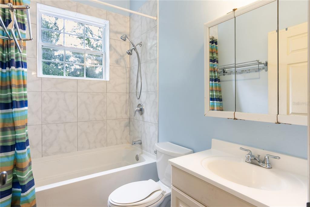 16295 Highway 40 Ocala, FL 34481 - Photo 33 of 39 a bathroom with a sink toilet and shower