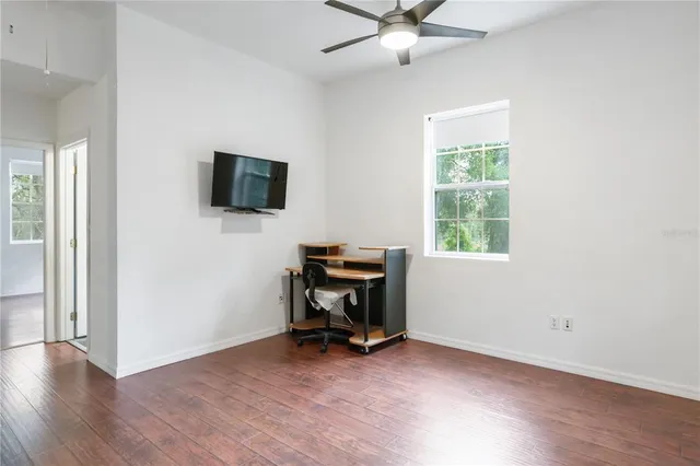 a view of a yard with swimming pool