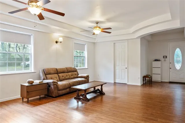 a living room with furniture and a window