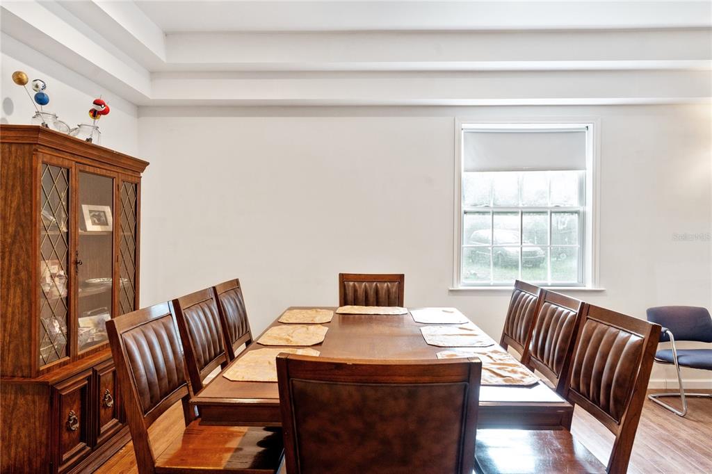 16295 Highway 40 Ocala, FL 34481 - Photo 7 of 39 a view of a dining room with furniture window and wooden floor