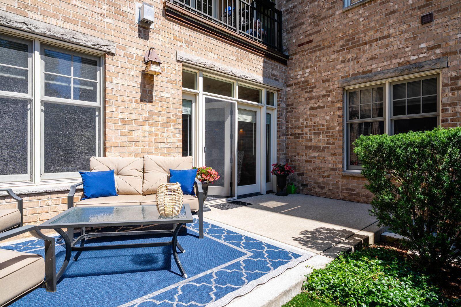13130 Watertown Plank Road, Unit 101 Elm Grove, WI 53122 - Photo 2 of 24 Private patio & entrance