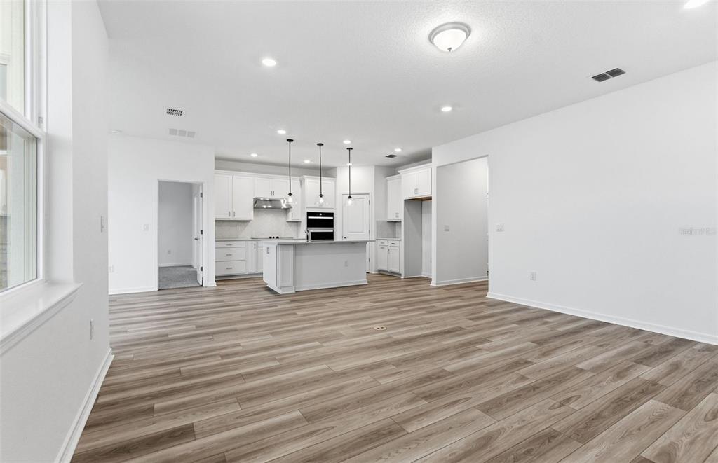 8339 Southwest 58 Loop Ocala, FL 34481 - Photo 7 of 35 a view of kitchen with wooden floor