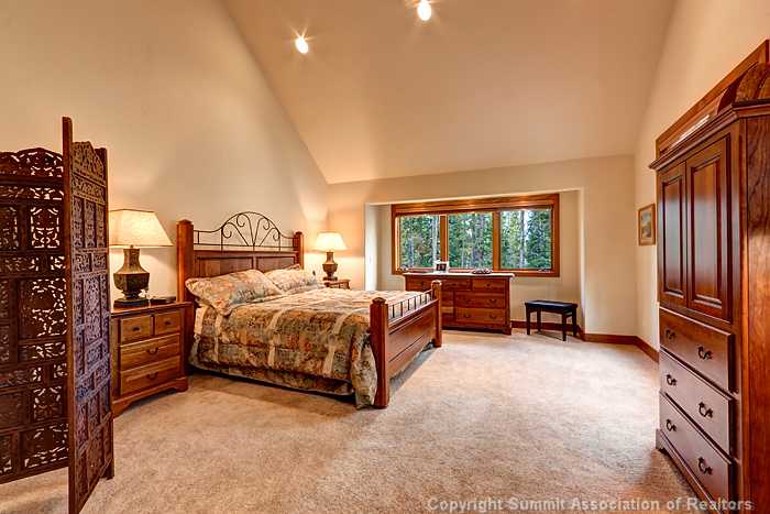 44 Bryce Estates Road Breckenridge, CO 80424 - Photo 5 of 15 Master Bedroom. Spacious Bedroom Suite w/ several sitting areas and sumptuous spa-like bath w/ large walk in closet;beautiful views!