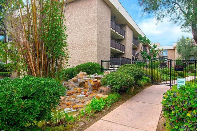 a view of a pathway with a house