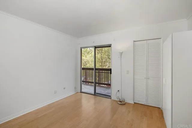 an empty room with sliding door