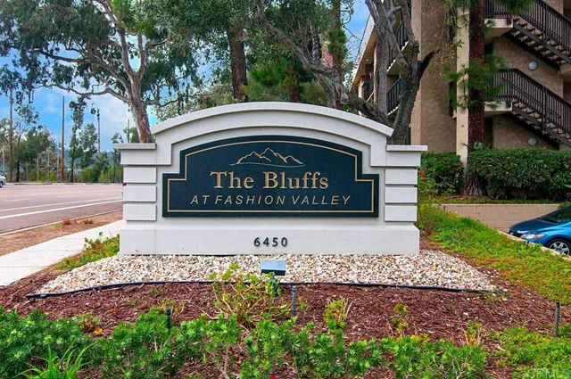 a view of sign board and yard