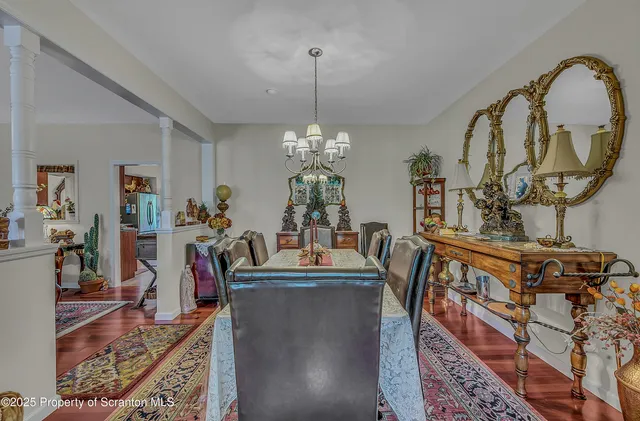 a view of a living room and dining room