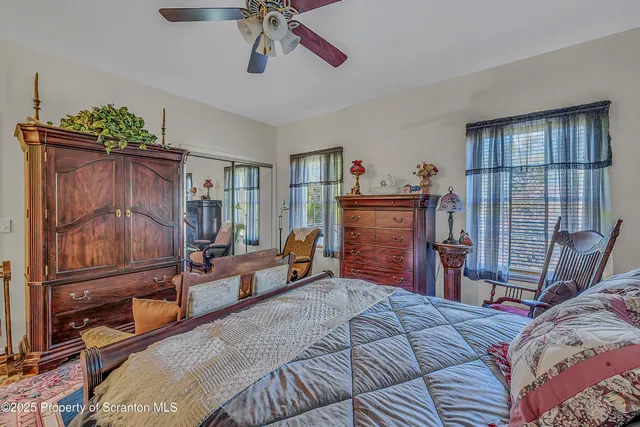 a bedroom with a bed and furniture