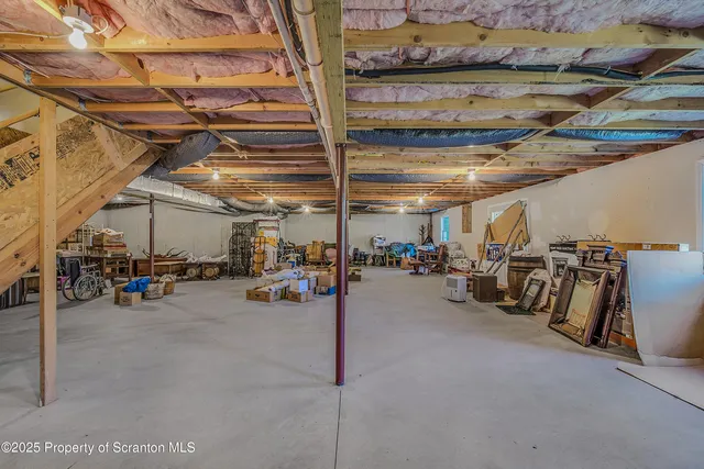 a view of parking garage with cars
