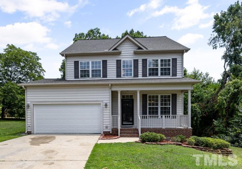 3308 Heygill Lane Raleigh, NC 27604 - Photo 1 of 18 a front view of a house with a yard and garage