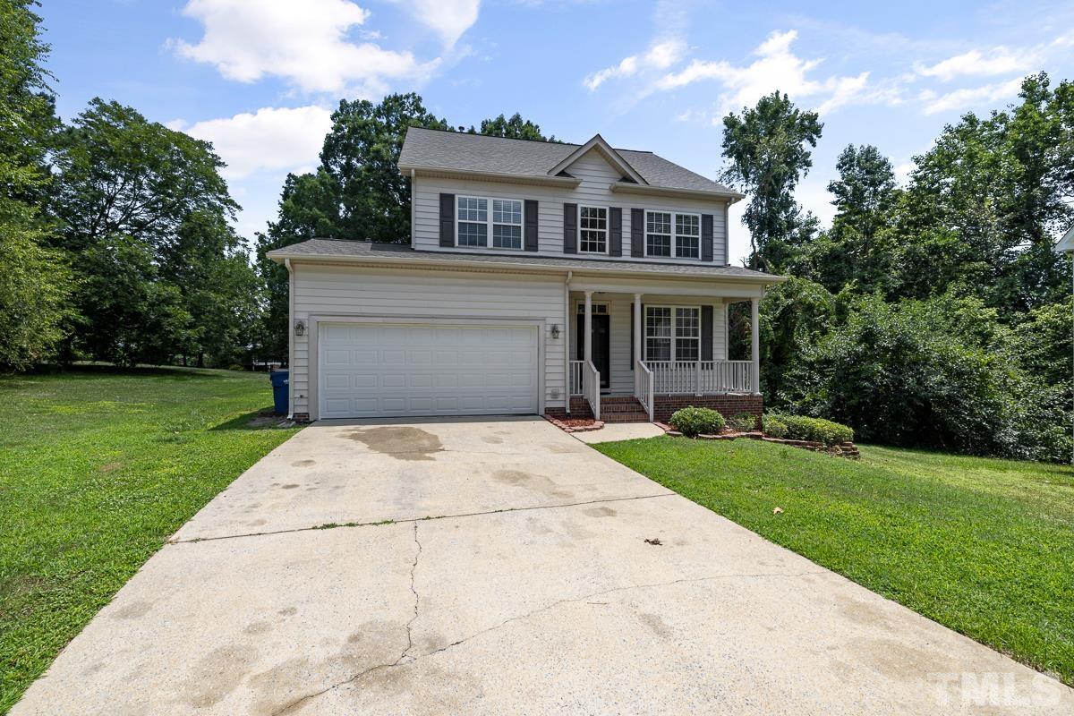 3308 Heygill Lane Raleigh, NC 27604 - Photo 3 of 18 a front view of a house with garden