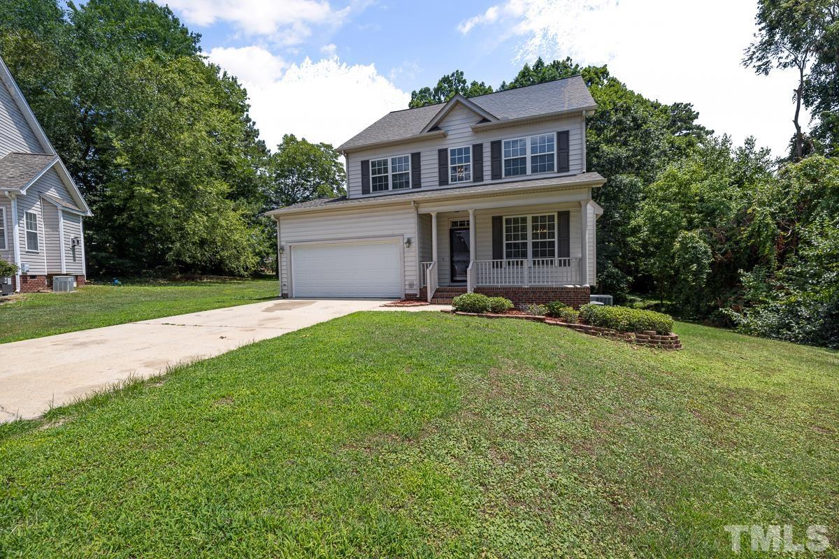3308 Heygill Lane Raleigh, NC 27604 - Photo 4 of 18 a front view of a house with yard and green space