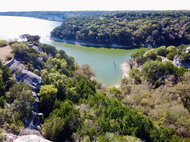 a view of a dry yard with wooden floor