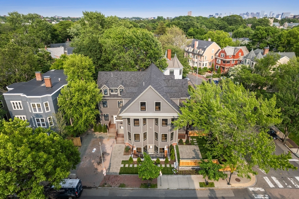 an aerial view of a house with a garden
