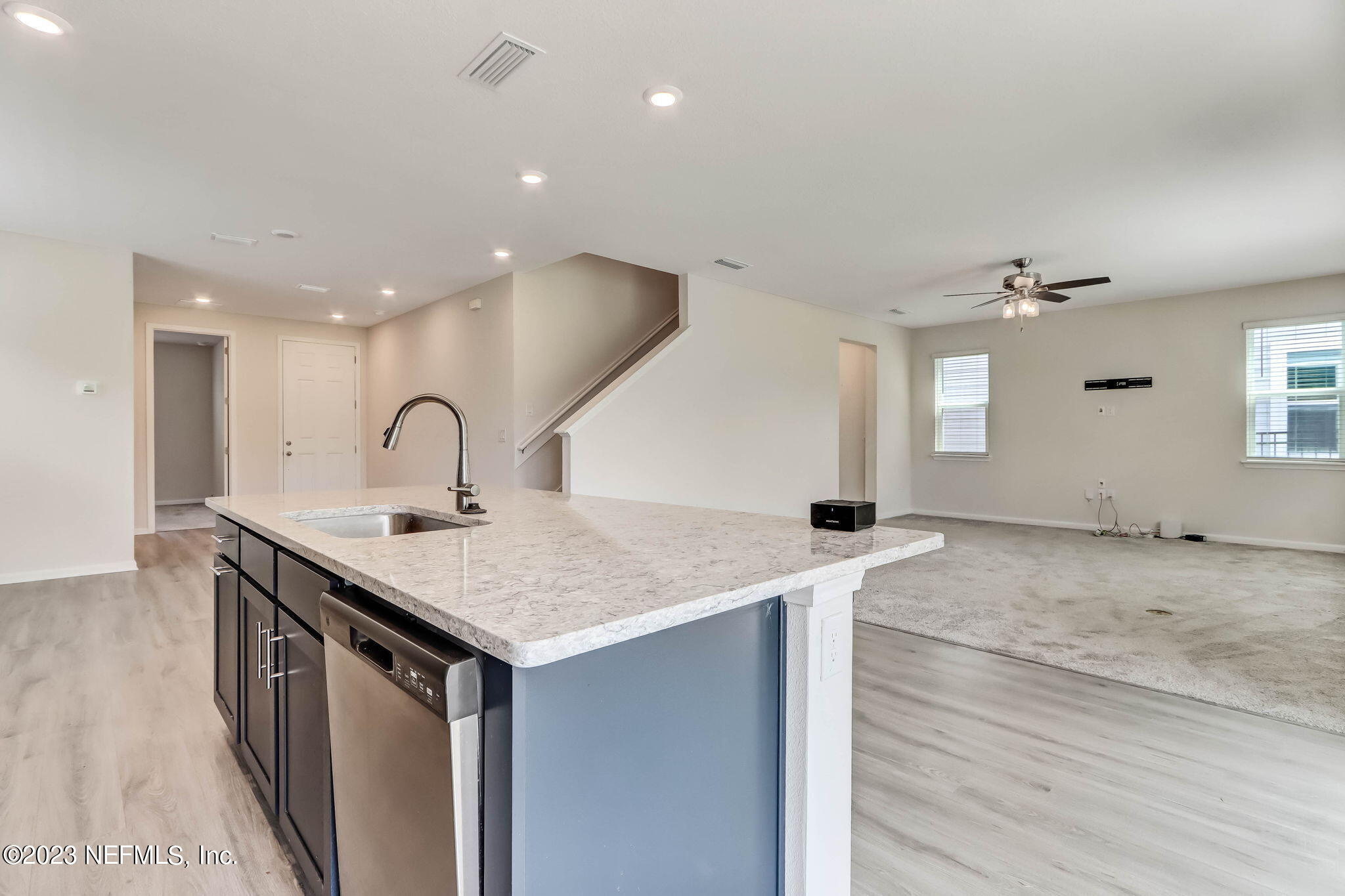 75944 Saffron Lane Yulee, FL 32097 - Photo 11 of 79 a kitchen with a sink a counter space and a window