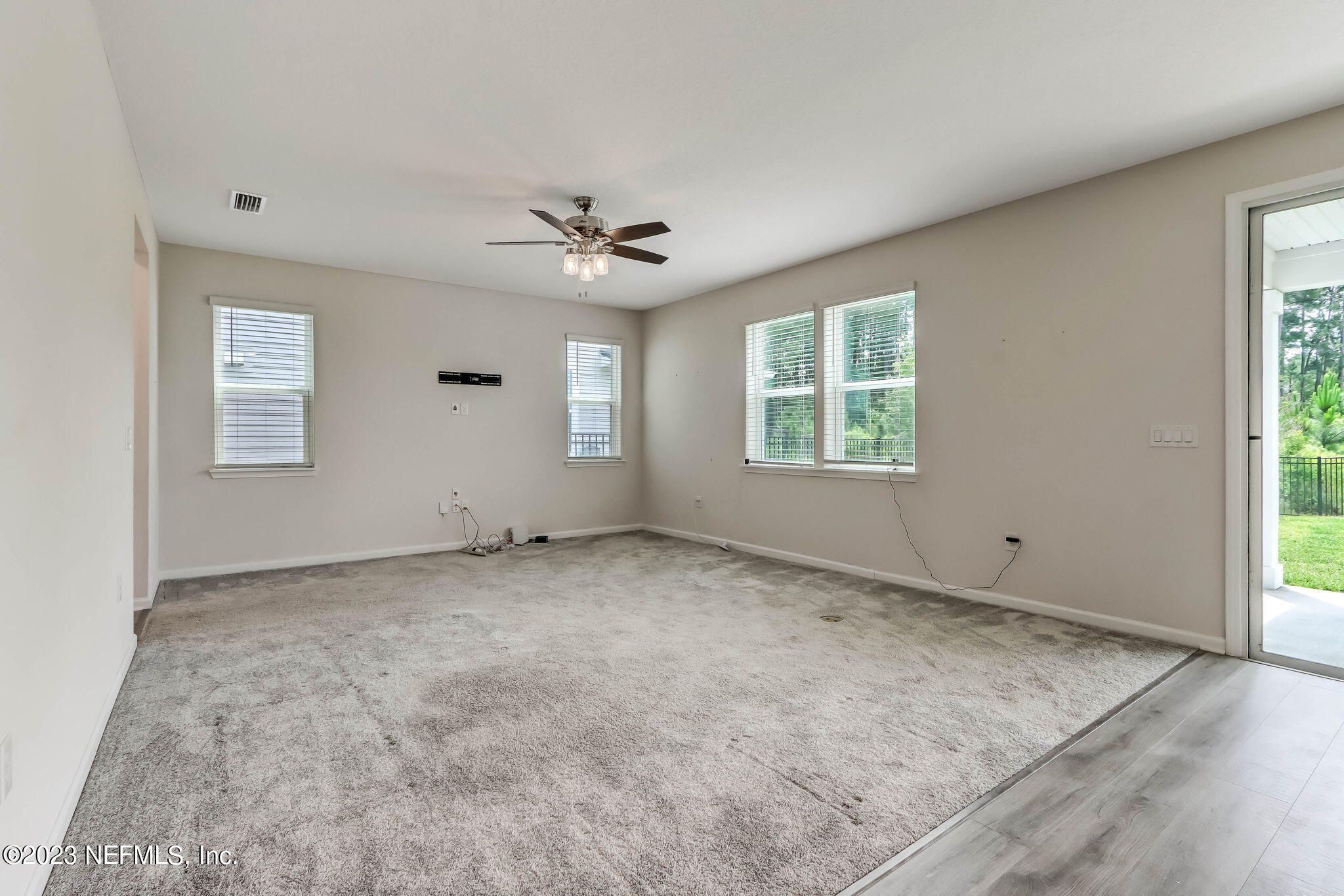 75944 Saffron Lane Yulee, FL 32097 - Photo 17 of 79 a view of an empty room with a window
