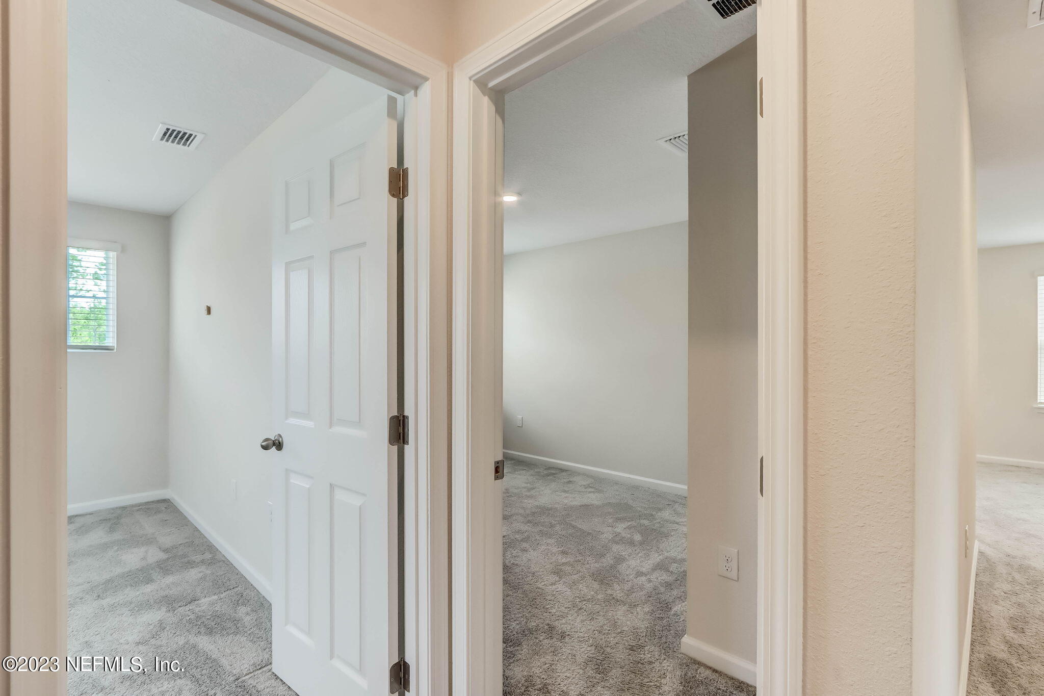 75944 Saffron Lane Yulee, FL 32097 - Photo 30 of 79 a view of a bathroom with a glass shower door