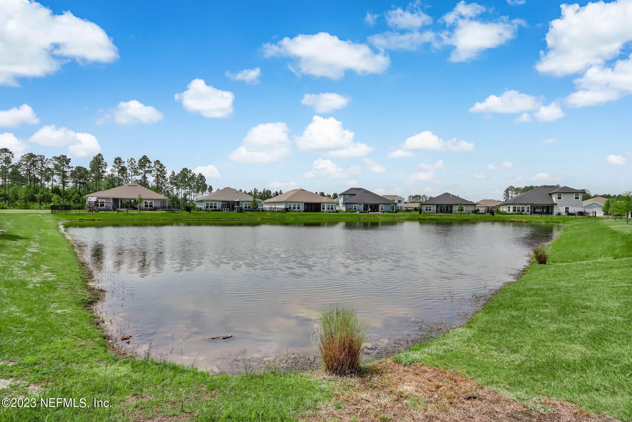 75944 Saffron Lane Yulee, FL 32097 - Photo 37 of 79 a view of a lake with a big yard