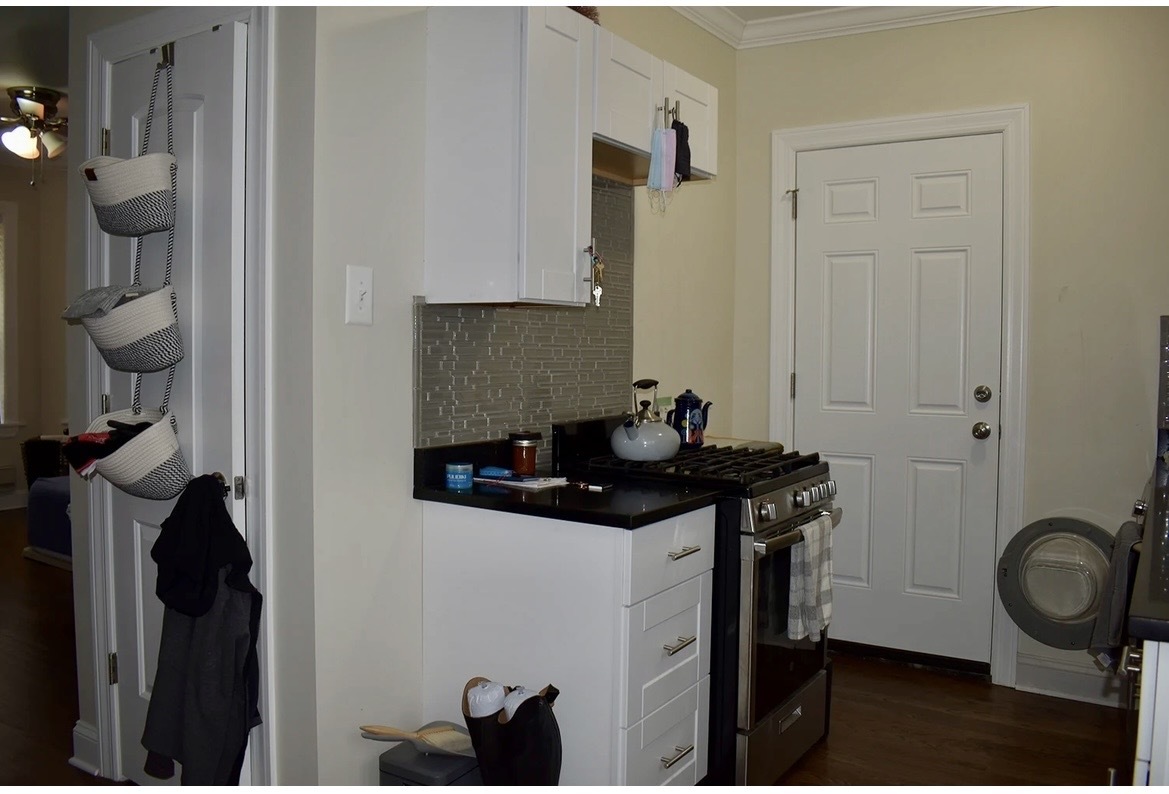 3817 North Greenview Avenue, Unit 3W Chicago, IL 60613 - Photo 5 of 10 a bathroom with a sink and a mirror