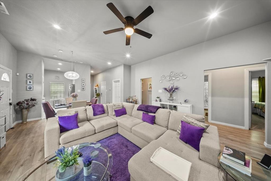 5312 Black Hawk Street Dallas, TX 75212 - Photo 20 of 24 a living room with furniture and kitchen view